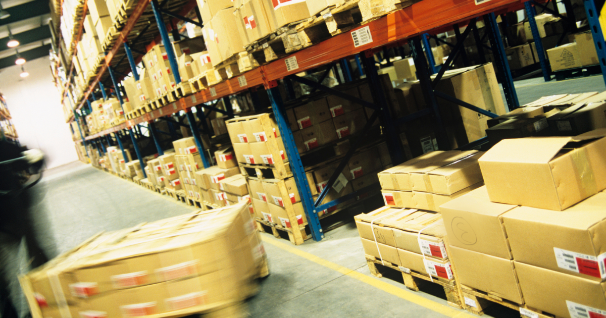 Boxes being moved in a warehouse